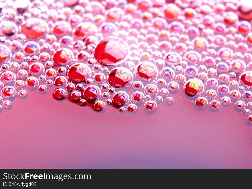 Bubbles in glass with wine