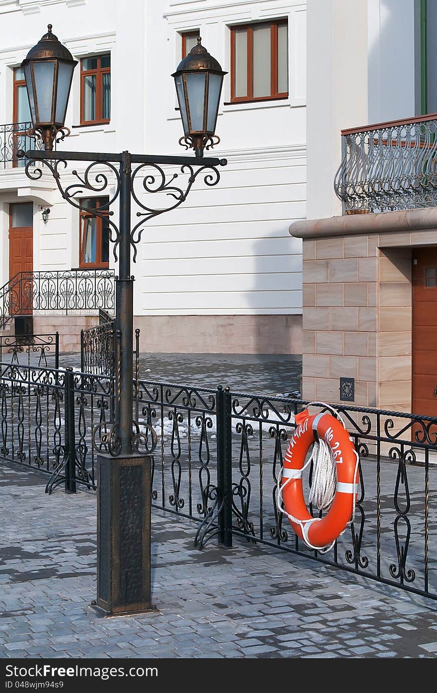 Llantern and lifebuoy on the waterfront of Balaklava in the Crimea, Ukraine