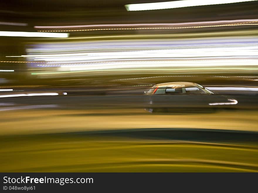 Night shot of a car in motion blur. Night shot of a car in motion blur