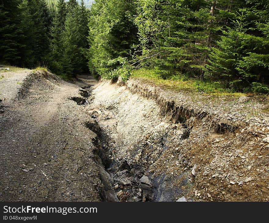 Cracked road in Carpathian mountains. Cracked road in Carpathian mountains