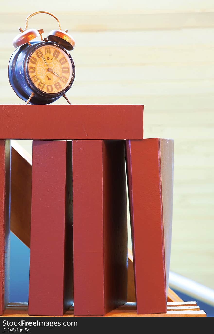 Clock and books