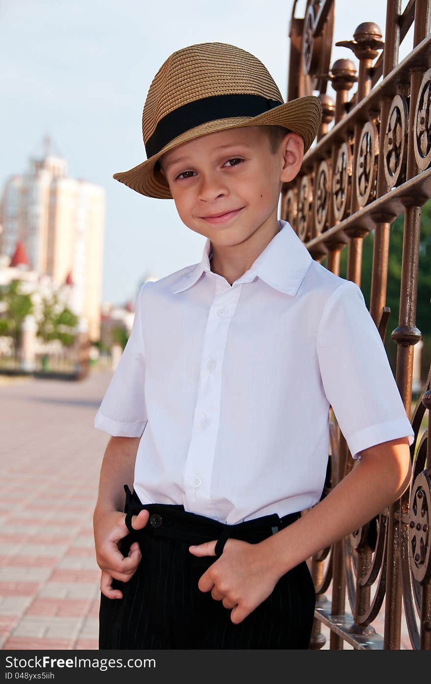 Portrait Of Little Boy In A Retro Hat.