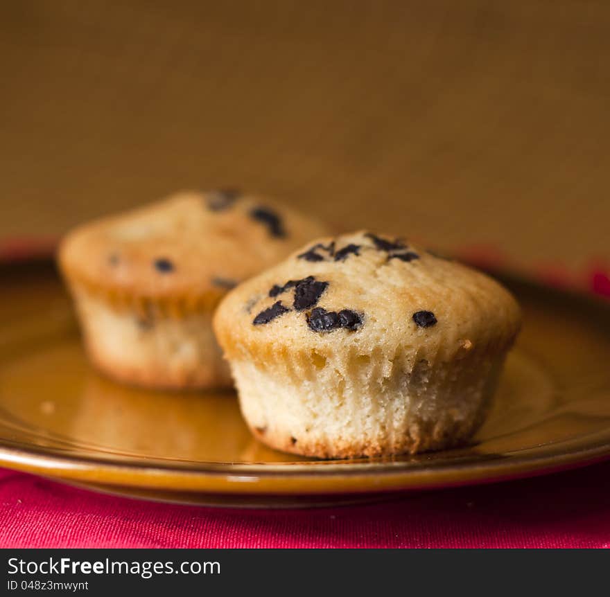 Two moffins on plate with decoration. Two moffins on plate with decoration