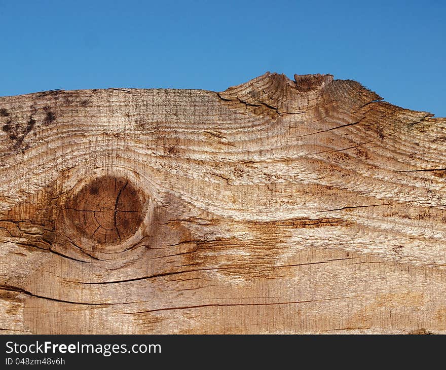 Wooden background with daylight. Outdoor texture. Wooden background with daylight. Outdoor texture