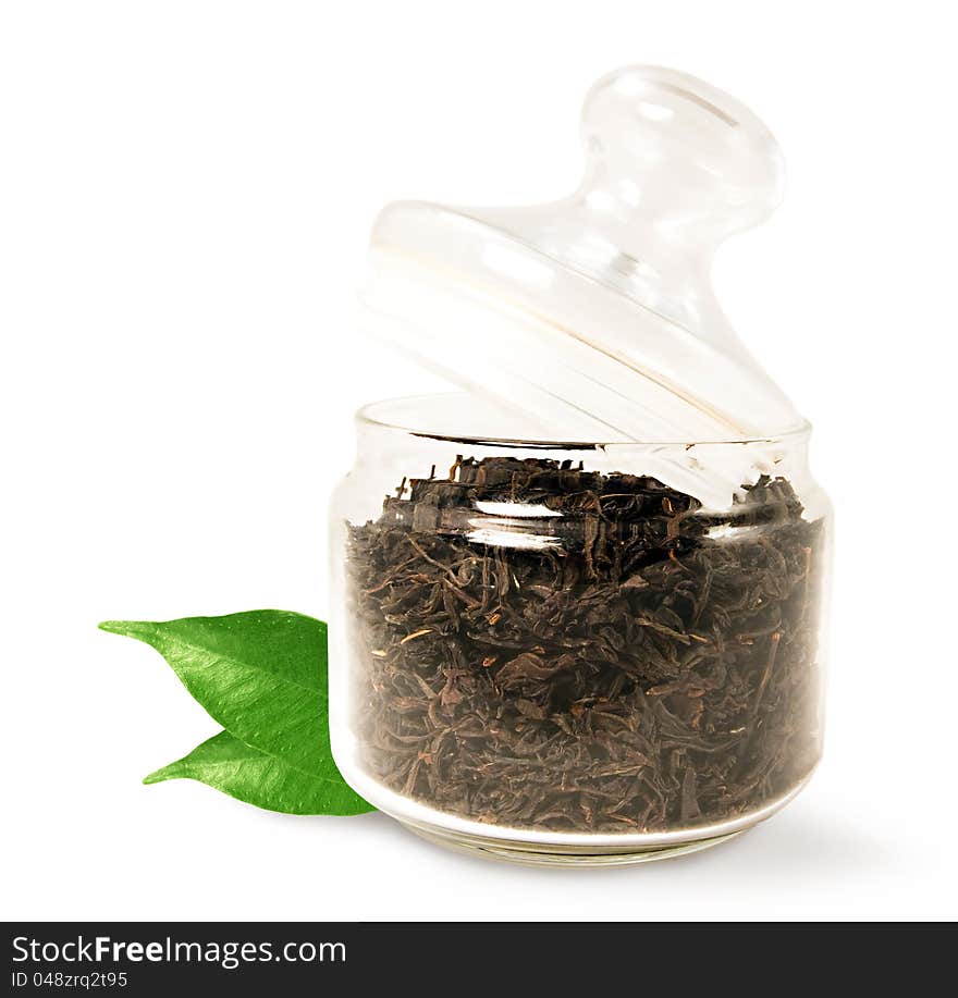 Tea in a glass jar on white background