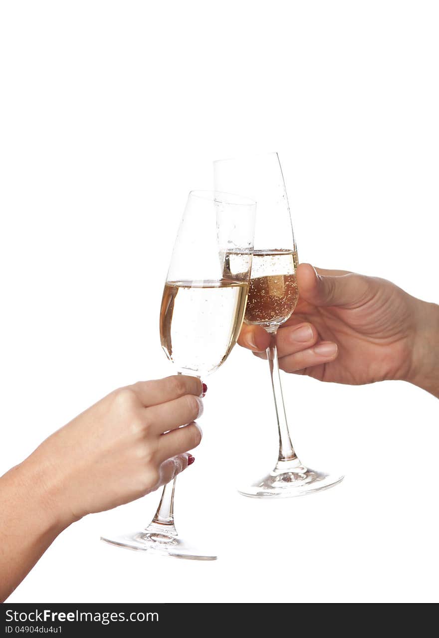 Glasses of champagne  in hands on white  background