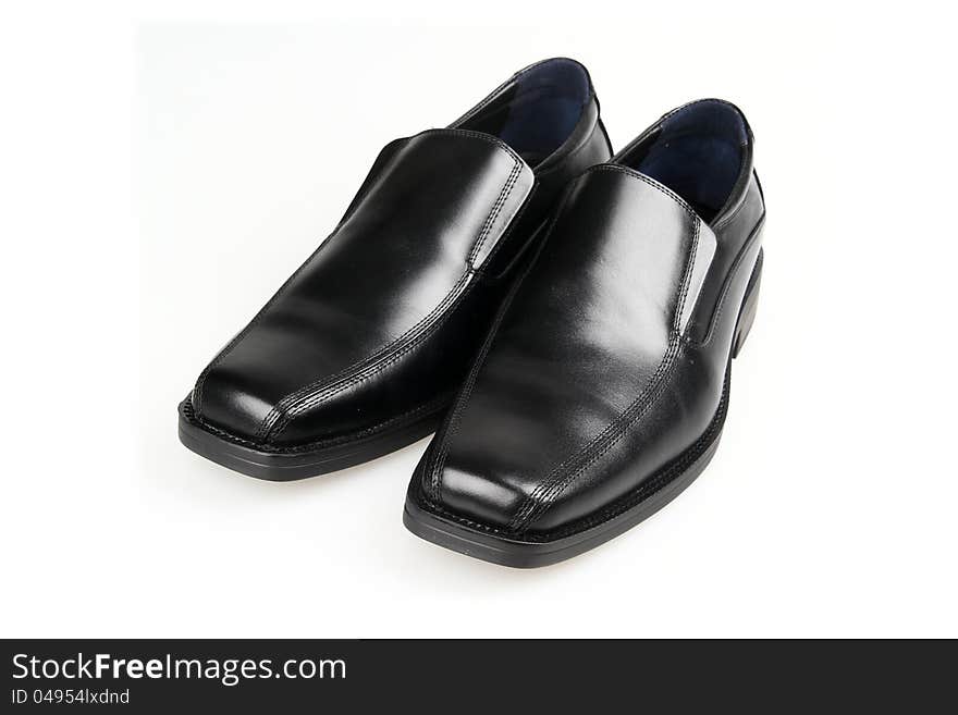 Black man's shoes on a white background. Black man's shoes on a white background.