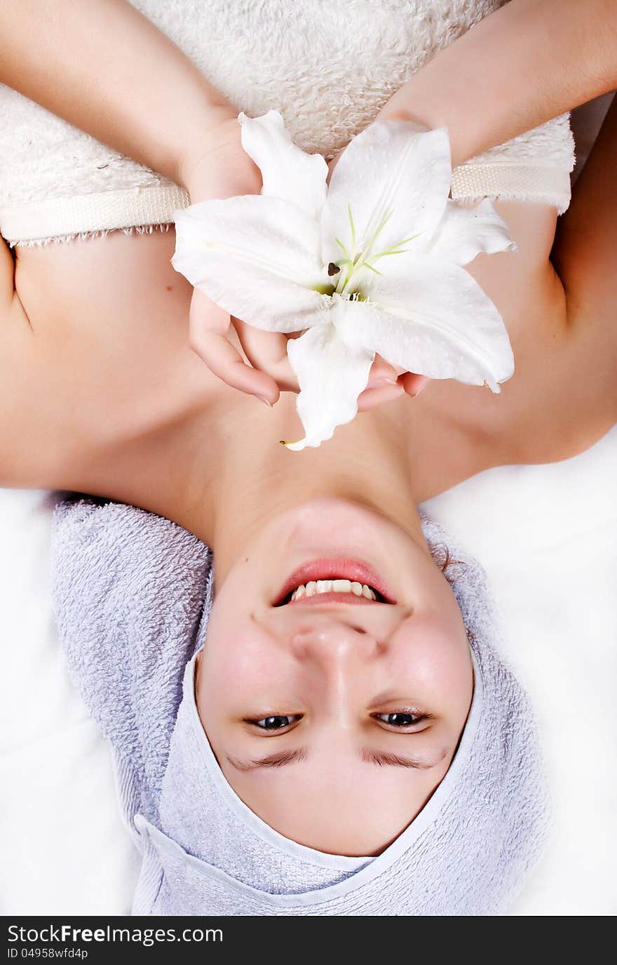 Beautiful girl with lily isolated