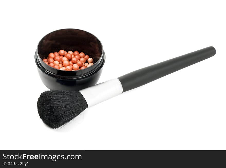 Blush cosmetics powder and makeup brush on white background