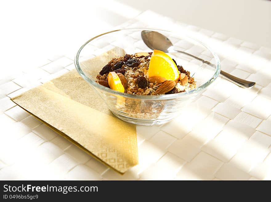 Muesli in a bowl with orange. Healthy. Muesli in a bowl with orange. Healthy