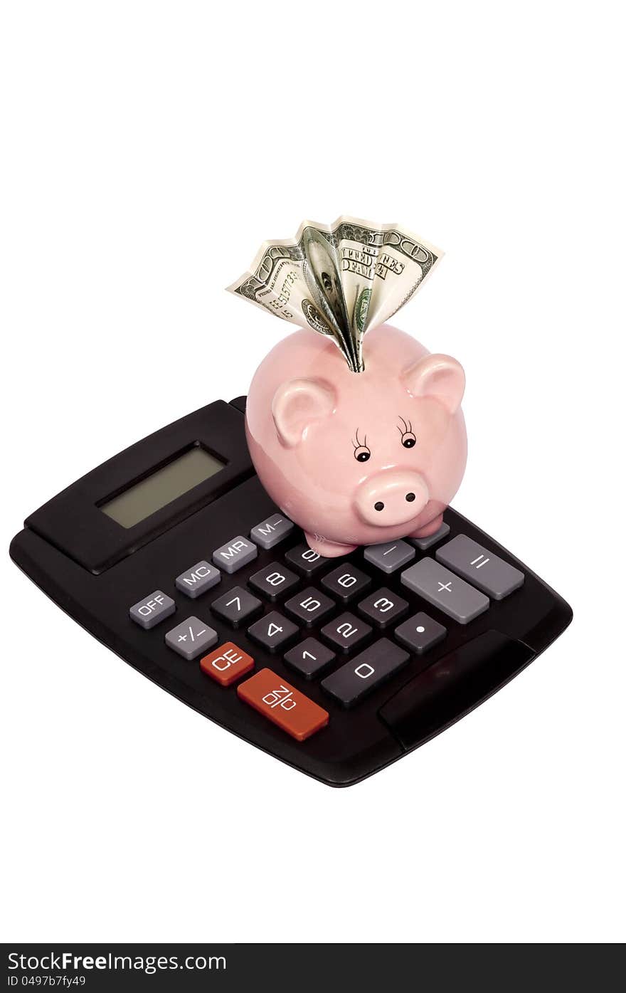 Vertical shot of calculator with piggy bank and hundred dollar bill in slot.  Isolated on white. Vertical shot of calculator with piggy bank and hundred dollar bill in slot.  Isolated on white.