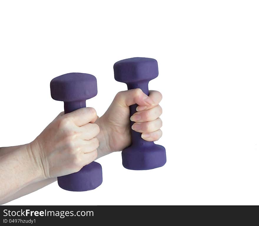 Female hands hold dumbbells