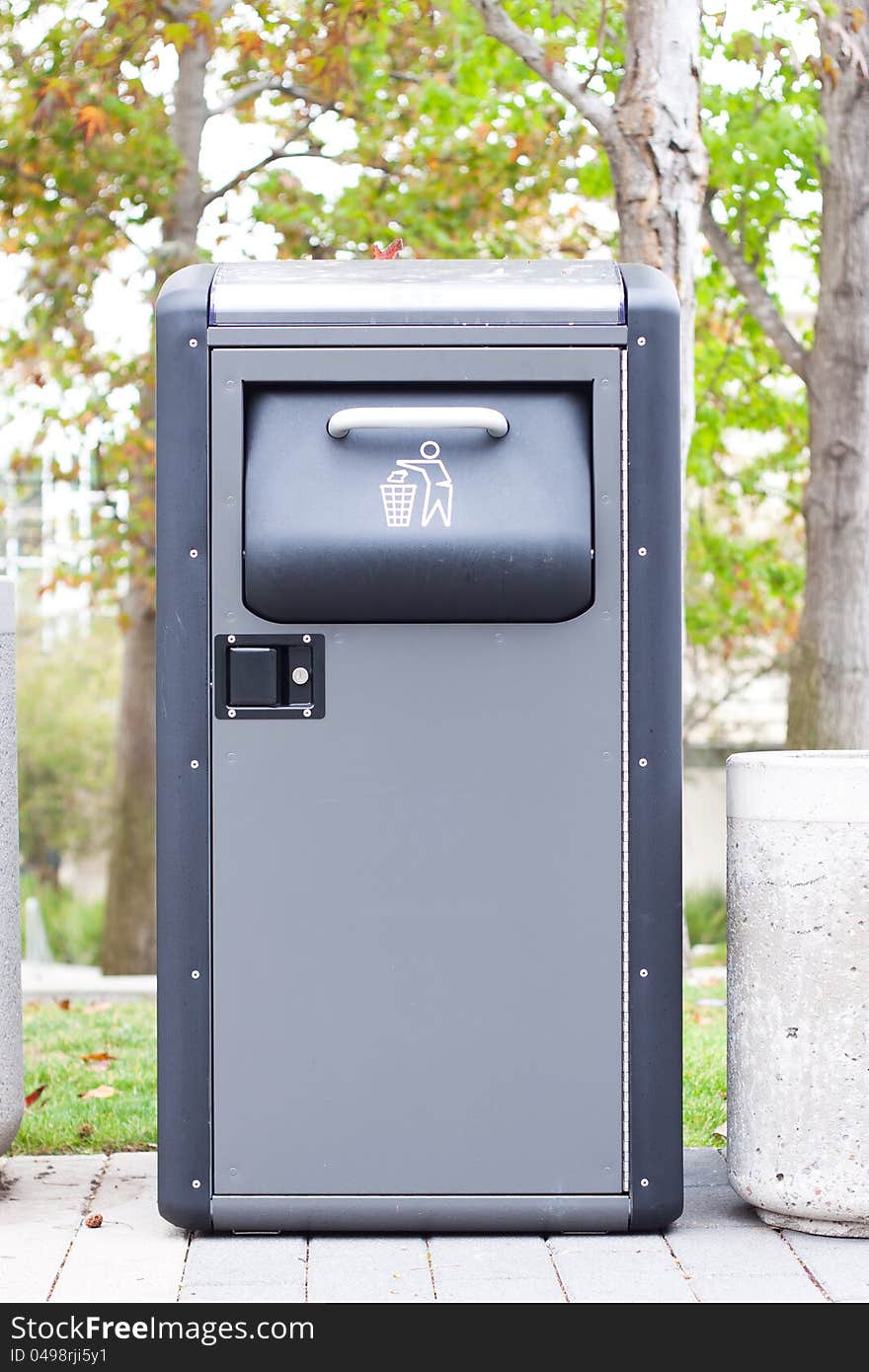 Metal Wastepaper Stand In The Park