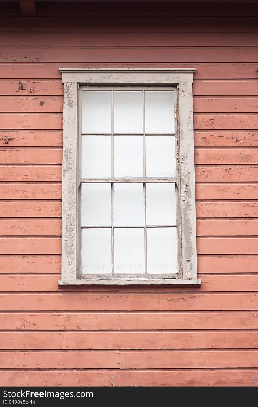 Building with brown wall and window front. Building with brown wall and window front