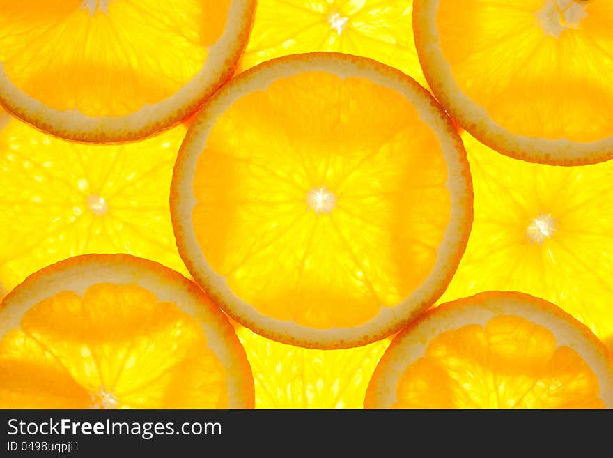 Orange slices background / macro / back-lit