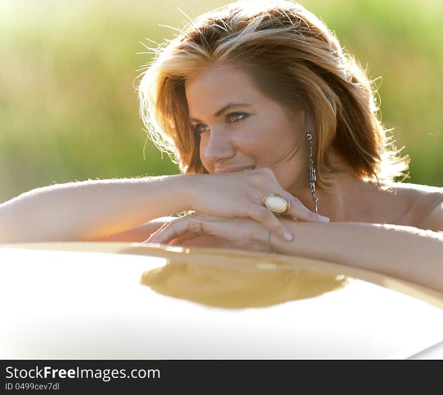 Portrait of a cute blonde enjoying the sun and nature. Portrait of a cute blonde enjoying the sun and nature