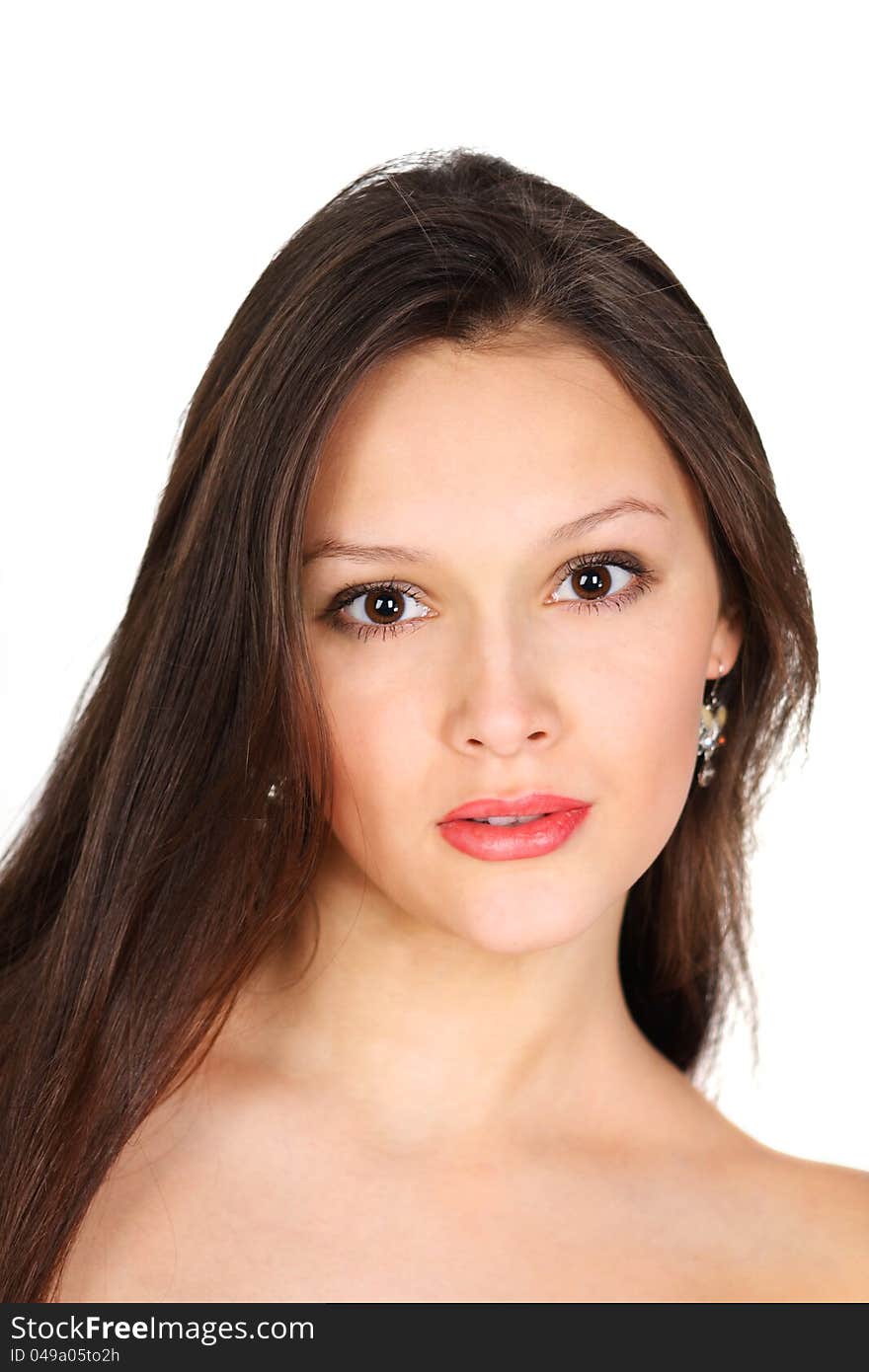 Pretty brunette girl looks at camera isolated on white background