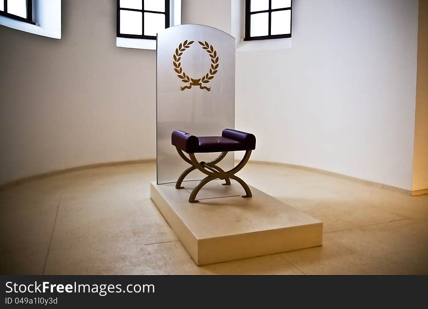 Minimalistic, mystic throne in empty room