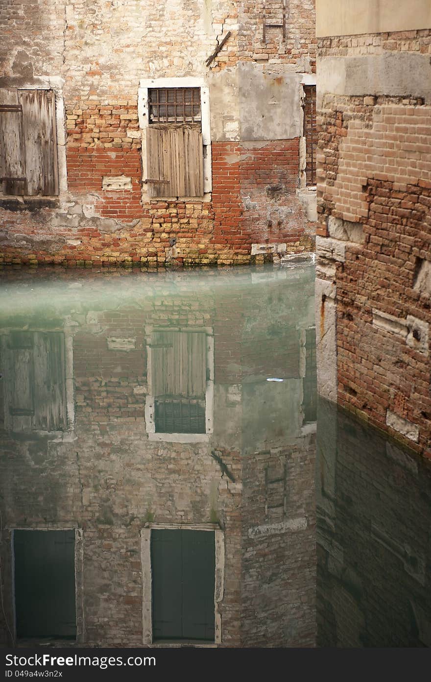 Reflection of old houses in a Venice canal. Reflection of old houses in a Venice canal