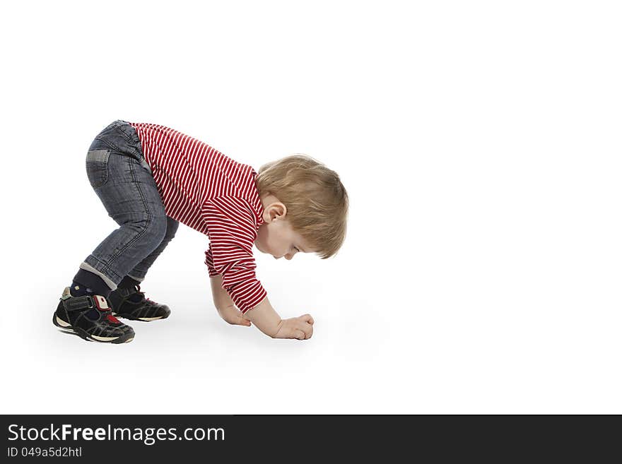 Image of baby crawling on a white