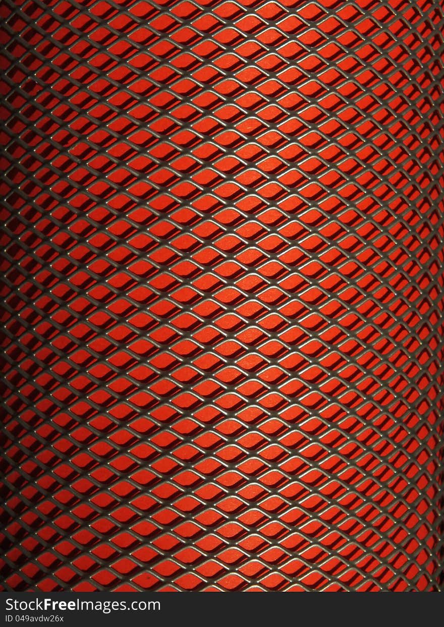 Metal texture with red background