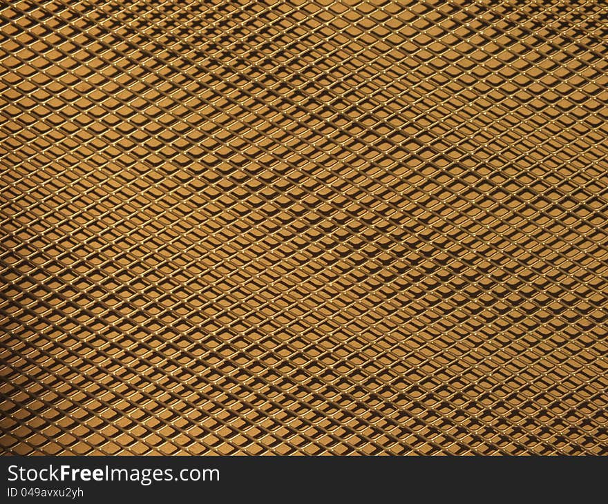 Metal texture with golden background