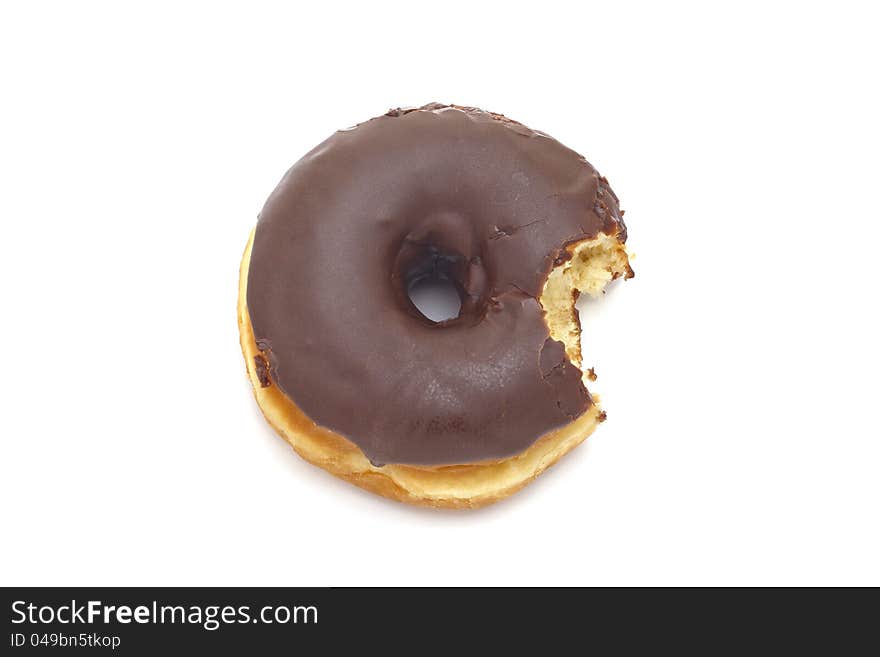 Single doughnut with chocolate icing, on white background