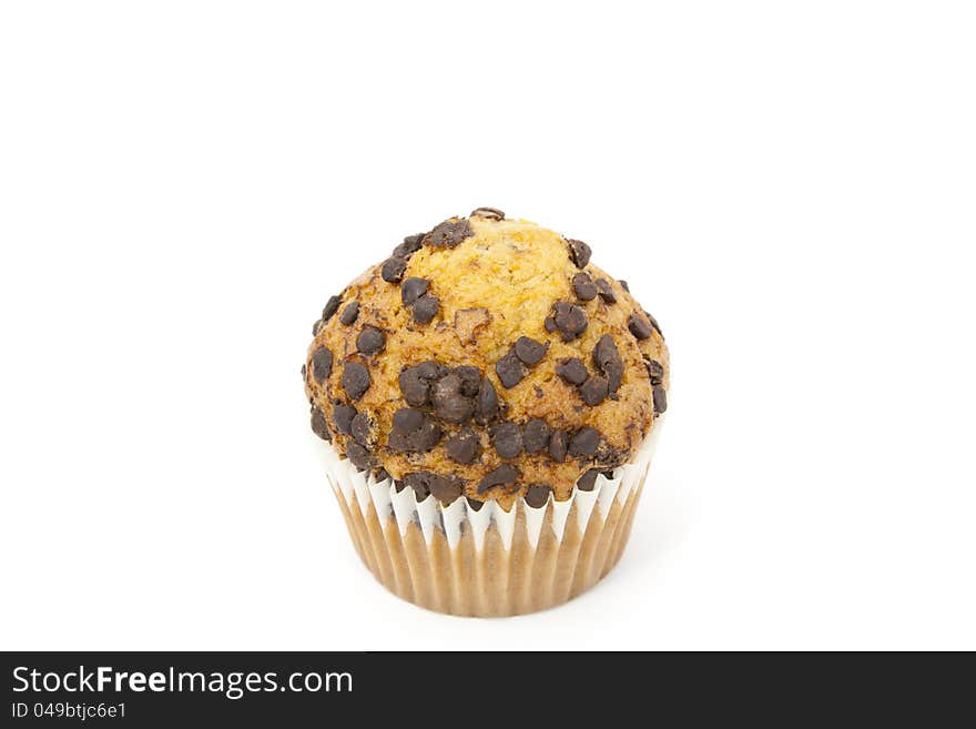 Delicious cupcake with chocolate flakes and white background. Delicious cupcake with chocolate flakes and white background