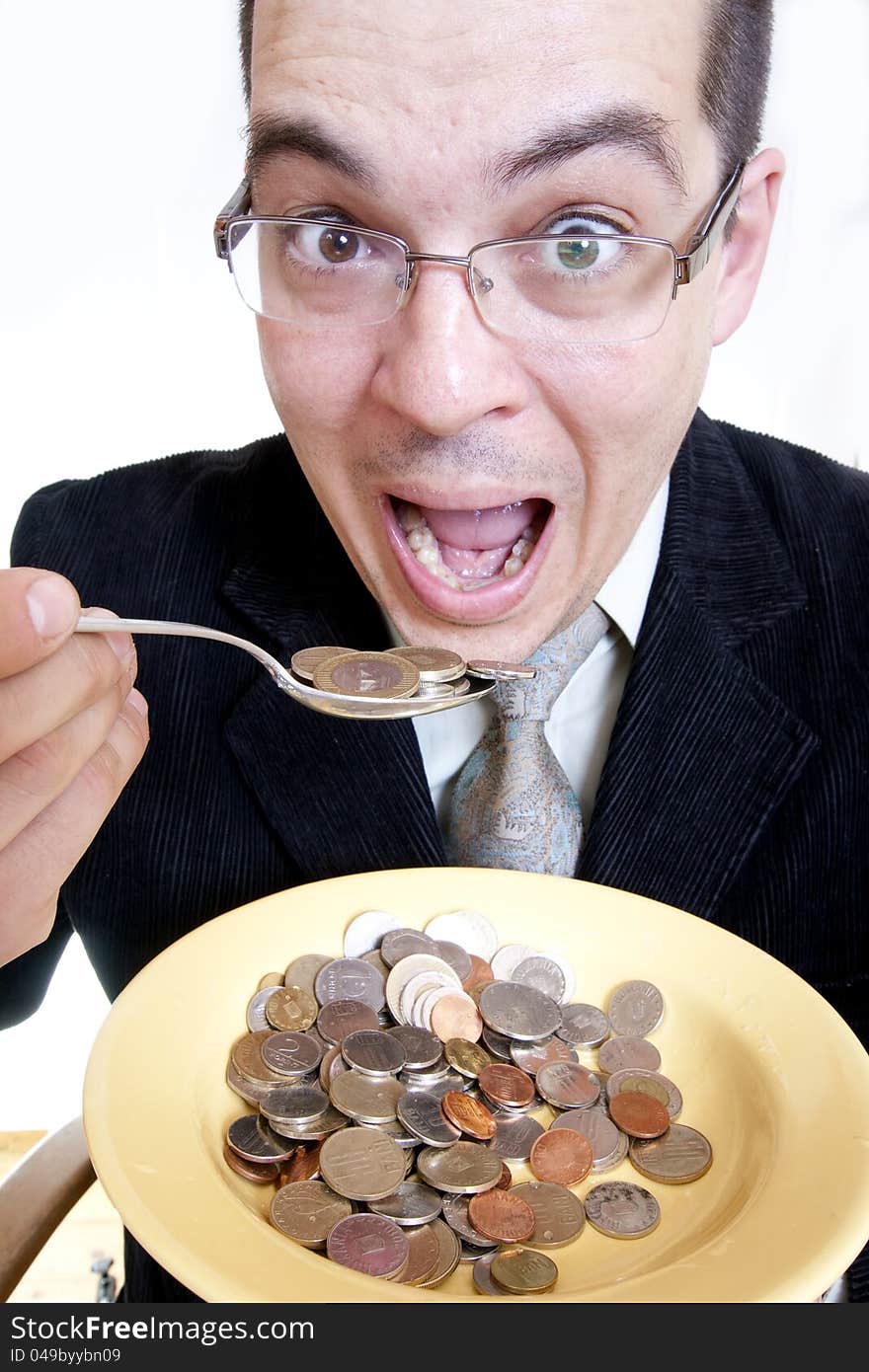 Businessman eating money