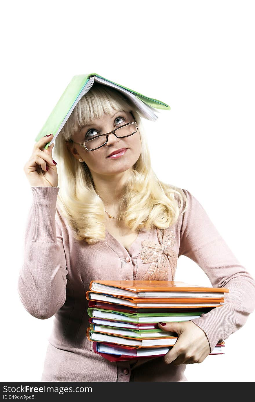 Girl holds a book on her head