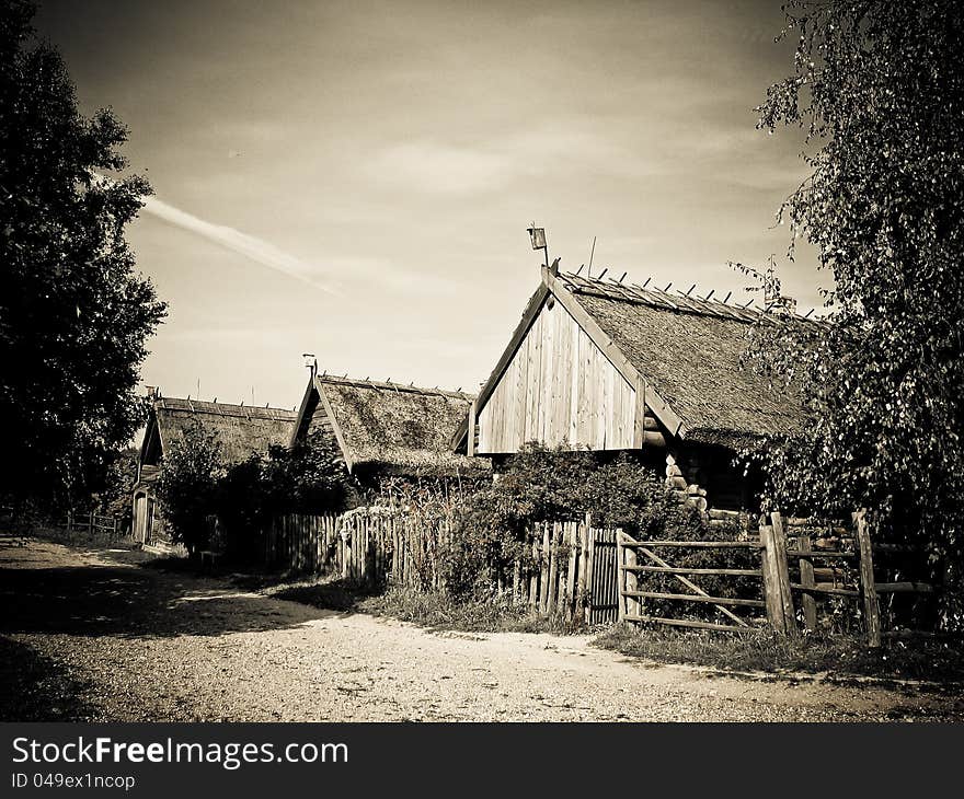 Retro house with a thatched roof, standing for a long time