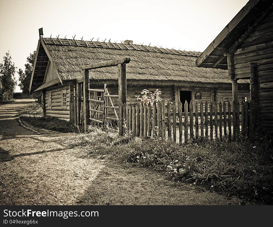 Retro house with a thatched roof, standing for a long time