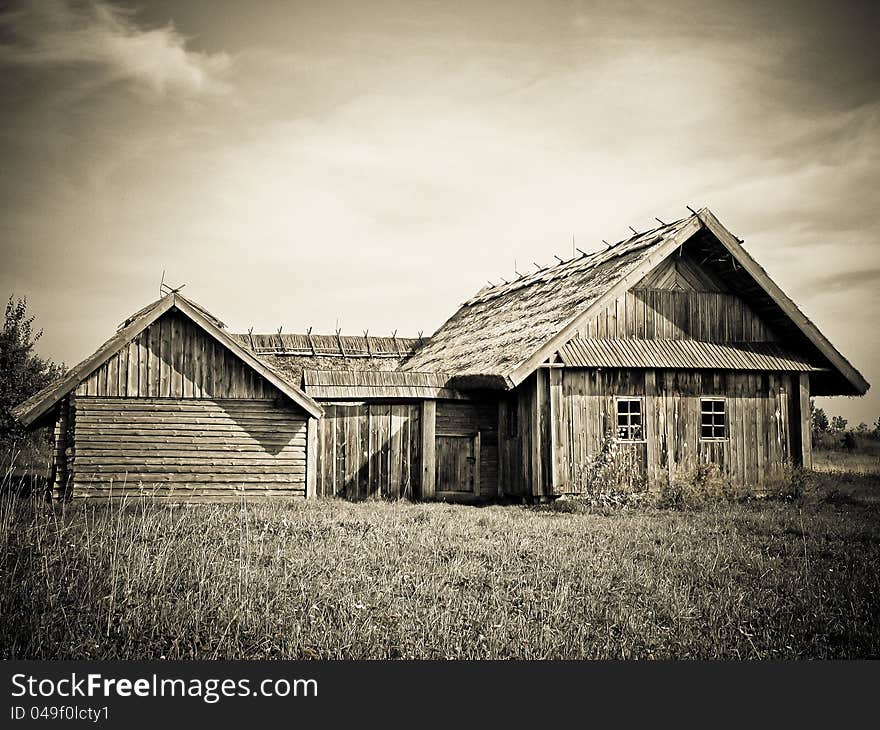 Retro house with a thatched roof, standing for a long time