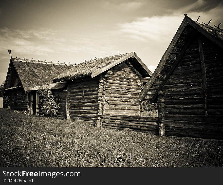 Retro house with a thatched roof, standing for a long time