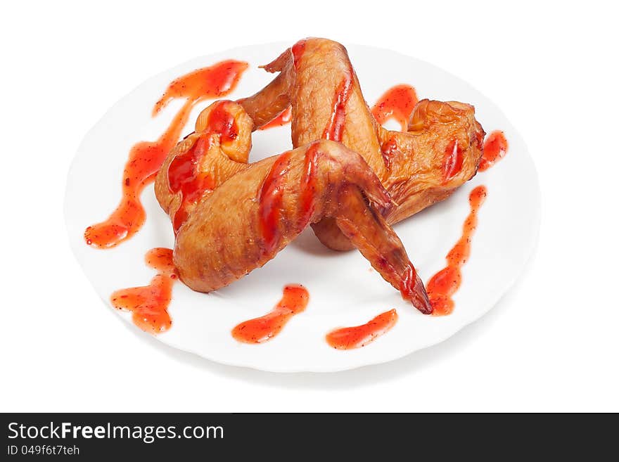 Smoked chicken wings on white background