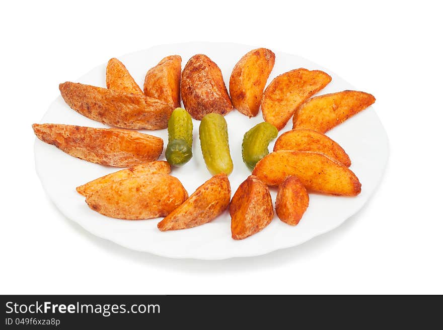 Fried potato with pickles isolated on white background