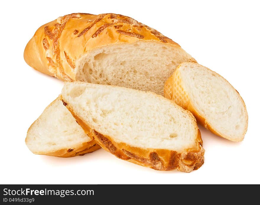 Cut white bread loaf against white background