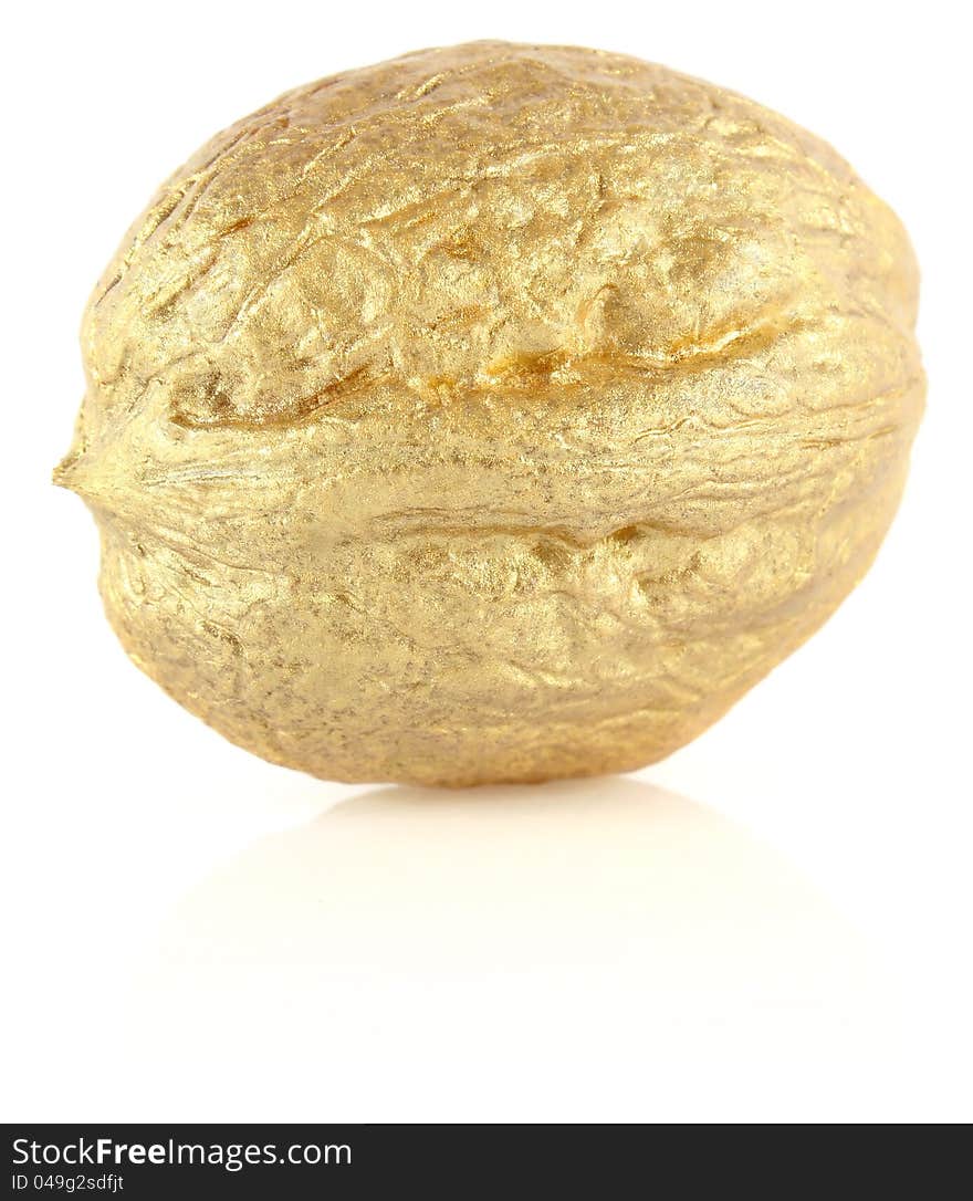 Golden wallnut on white background