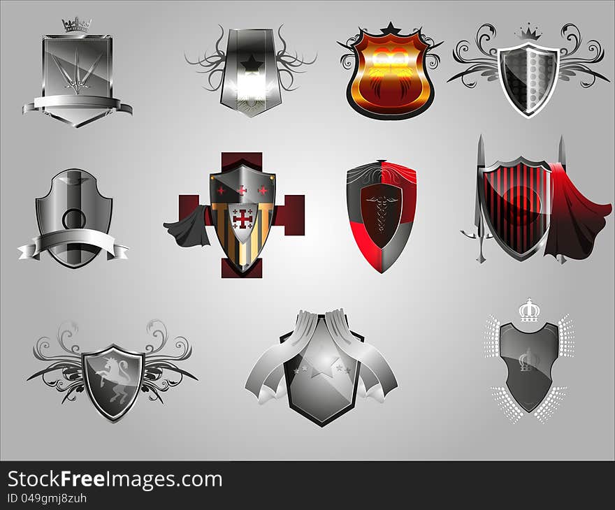 A set of 11 metallic medieval shields. A set of 11 metallic medieval shields.