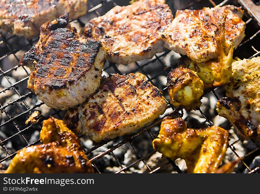 Chicken Wings On The Grill And Pork