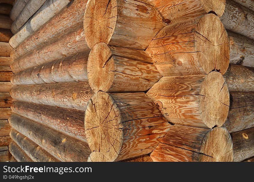 Wall of the rural house from wooden logs