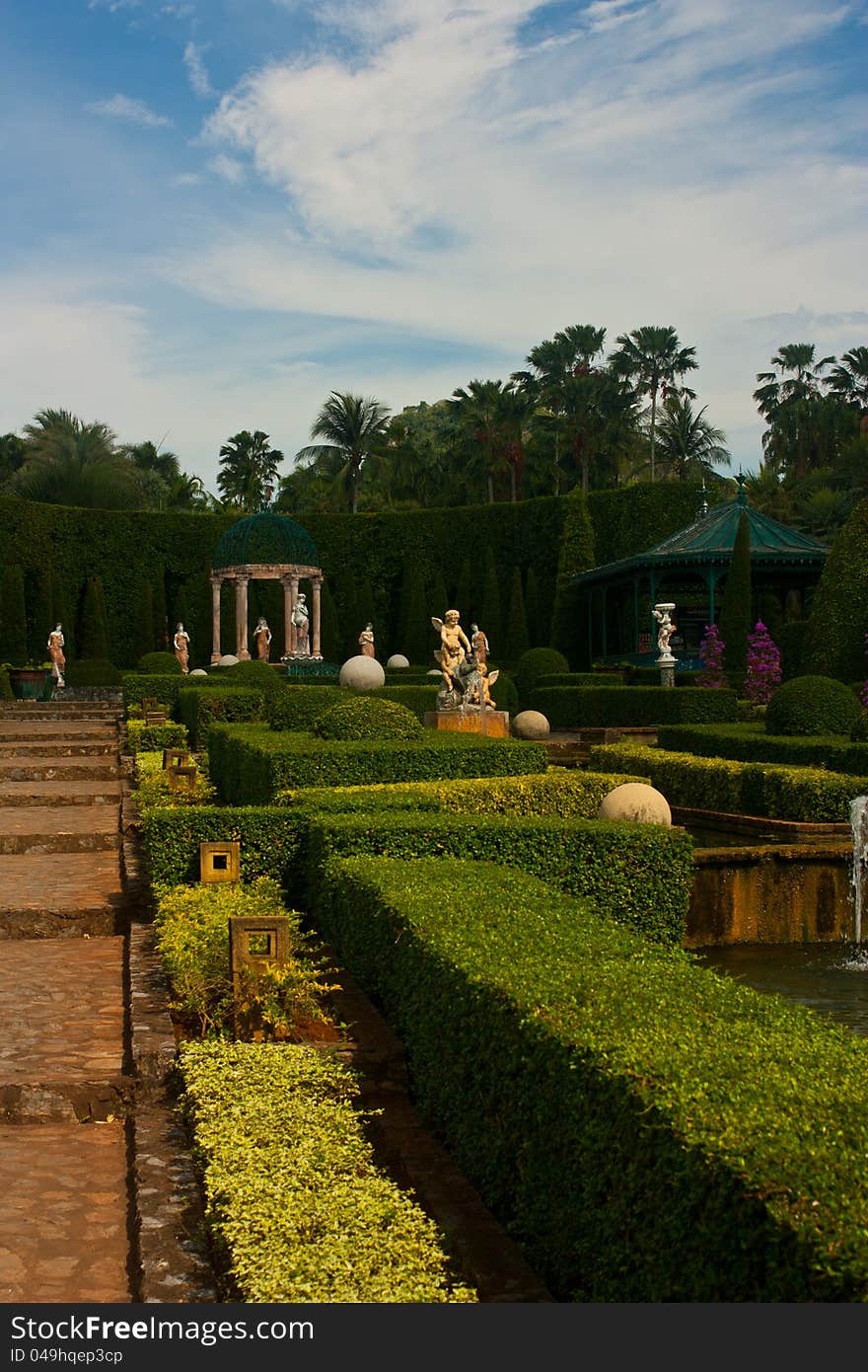 A cozy French park on a sunny day. A cozy French park on a sunny day