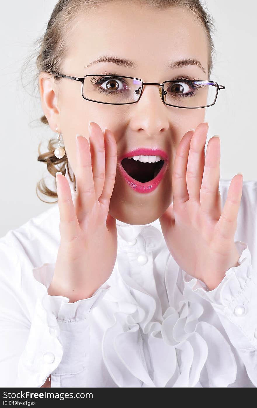 Attractive business woman with glasses shouting