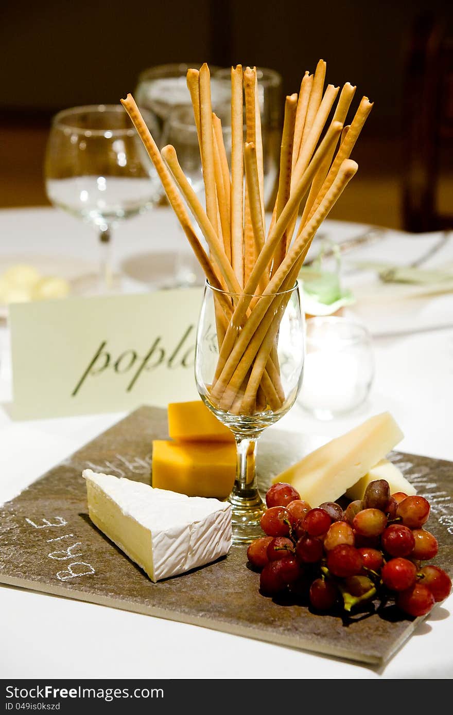 Cheese and bread sticks set out during a catered event