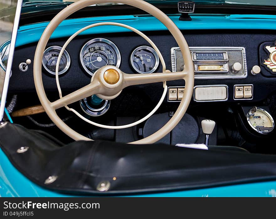 Interior of an blue classic retro car