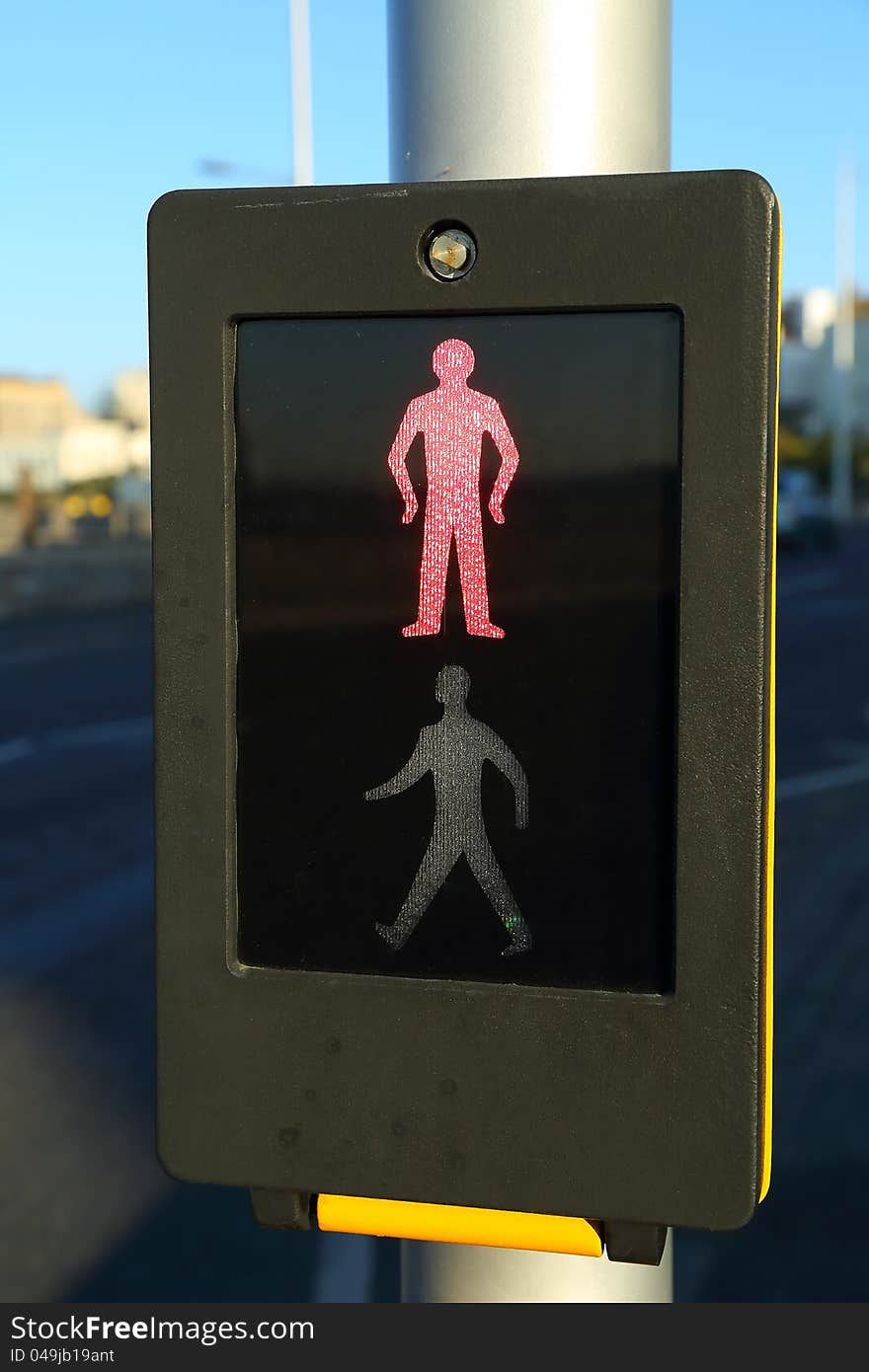 A pedestrian notification sign telling the person not to walk. A pedestrian notification sign telling the person not to walk