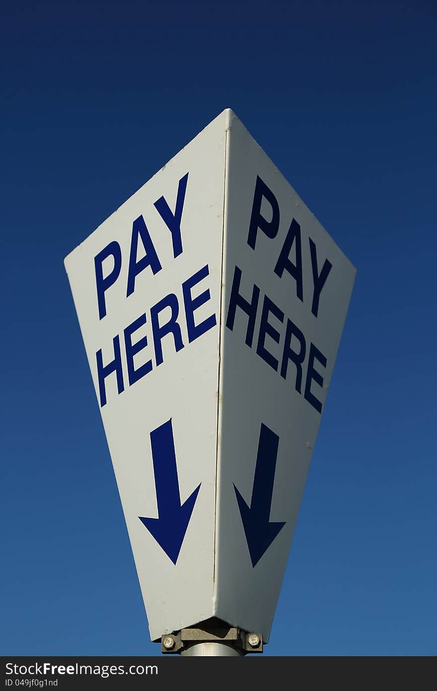 A sign indicating where a customer can pay for parking. A sign indicating where a customer can pay for parking