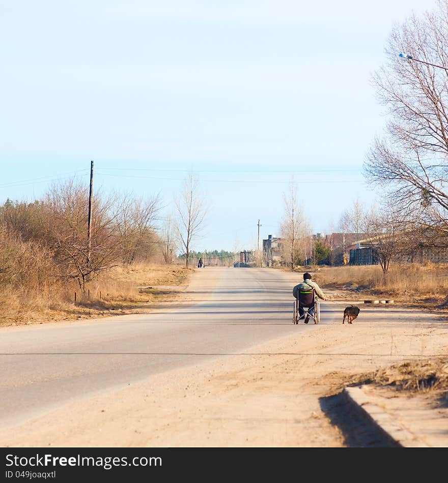 Man in wkeelchair with dog