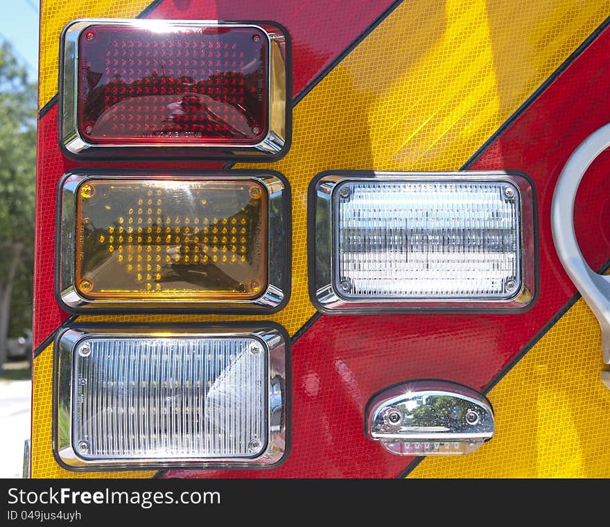 Tail lights of a firetruck on a sunny day. Tail lights of a firetruck on a sunny day