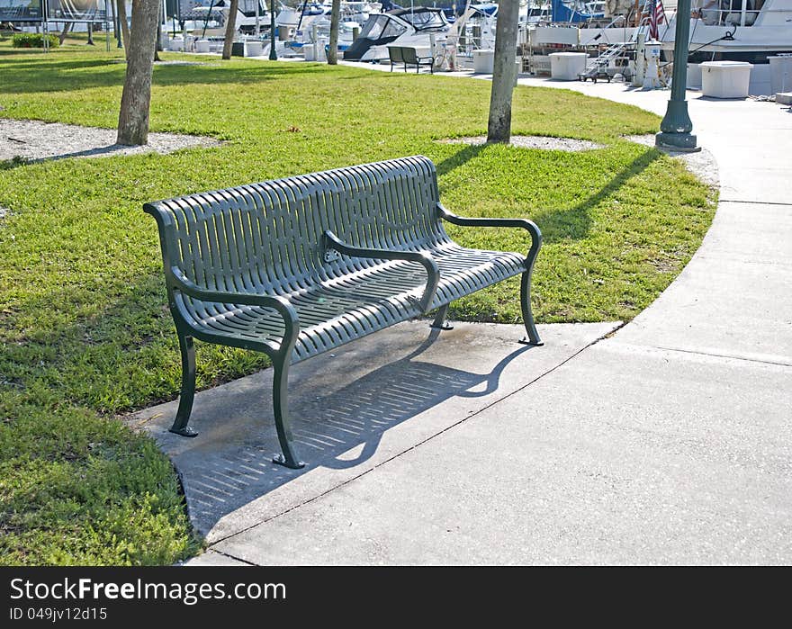 Green metal bench